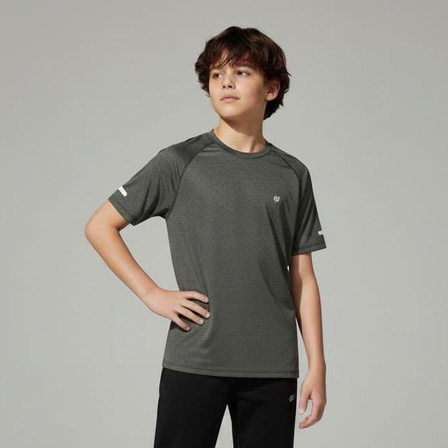 Person wearing a gray t-shirt and black pants on a plain background